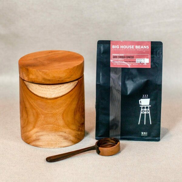 Fcoffee canister with scoop bag beside