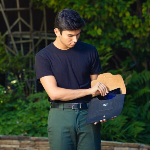 man pulling ipad out of sleeve