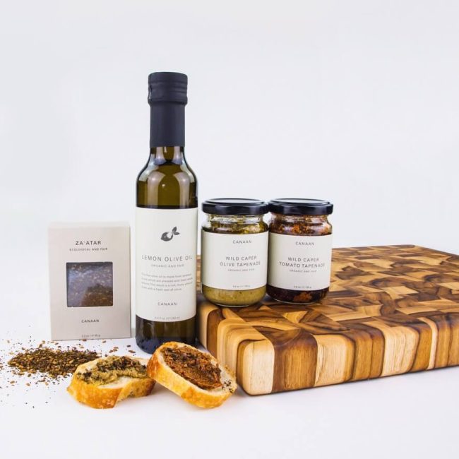 Gift set: wooden butcher block, olive oil, and two tapenades