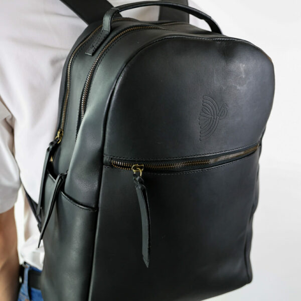 Our leather backpack for travel in black.