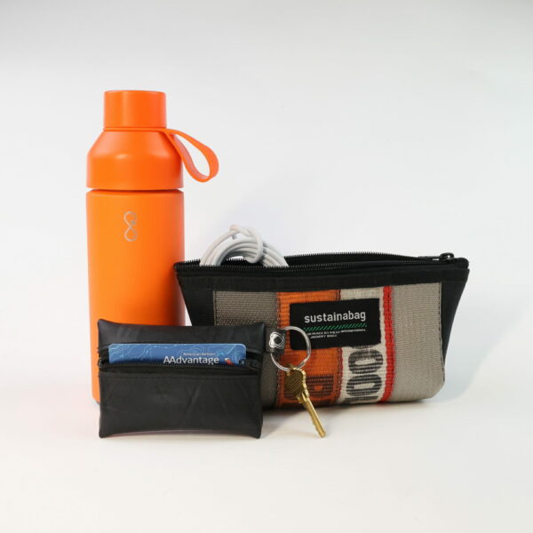 Earth Hero contains three sustainable tech gifts: a water bottle, cable pouch, and coin bag keychain.