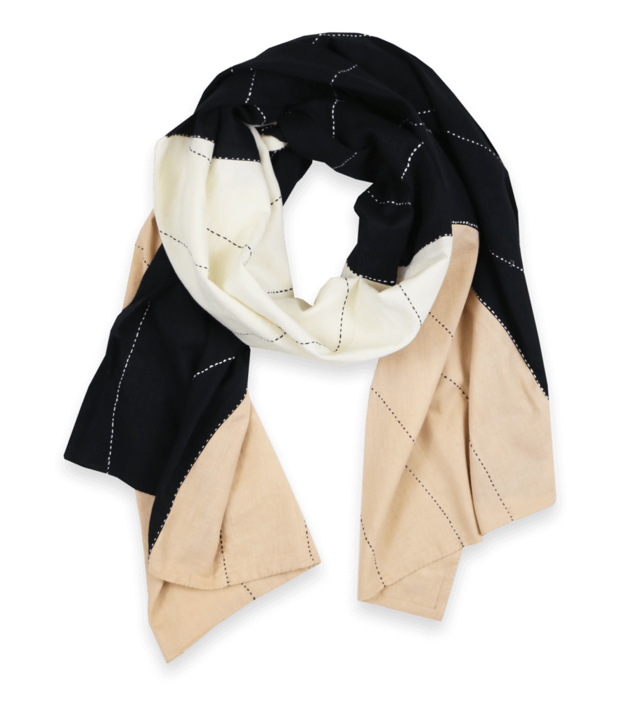 a beige, cream, and black colorblocked scarf makes a unique and beautiful International Women's Day gift