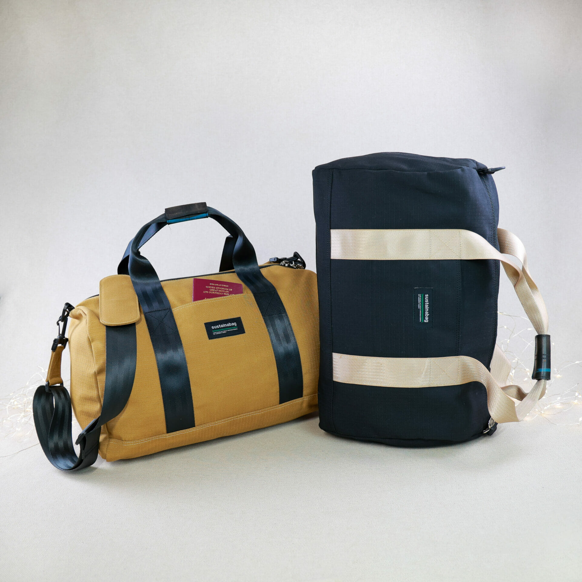 Upcycled Overnight Bag Two bags, gold and black, made of upcycled materials except hardware