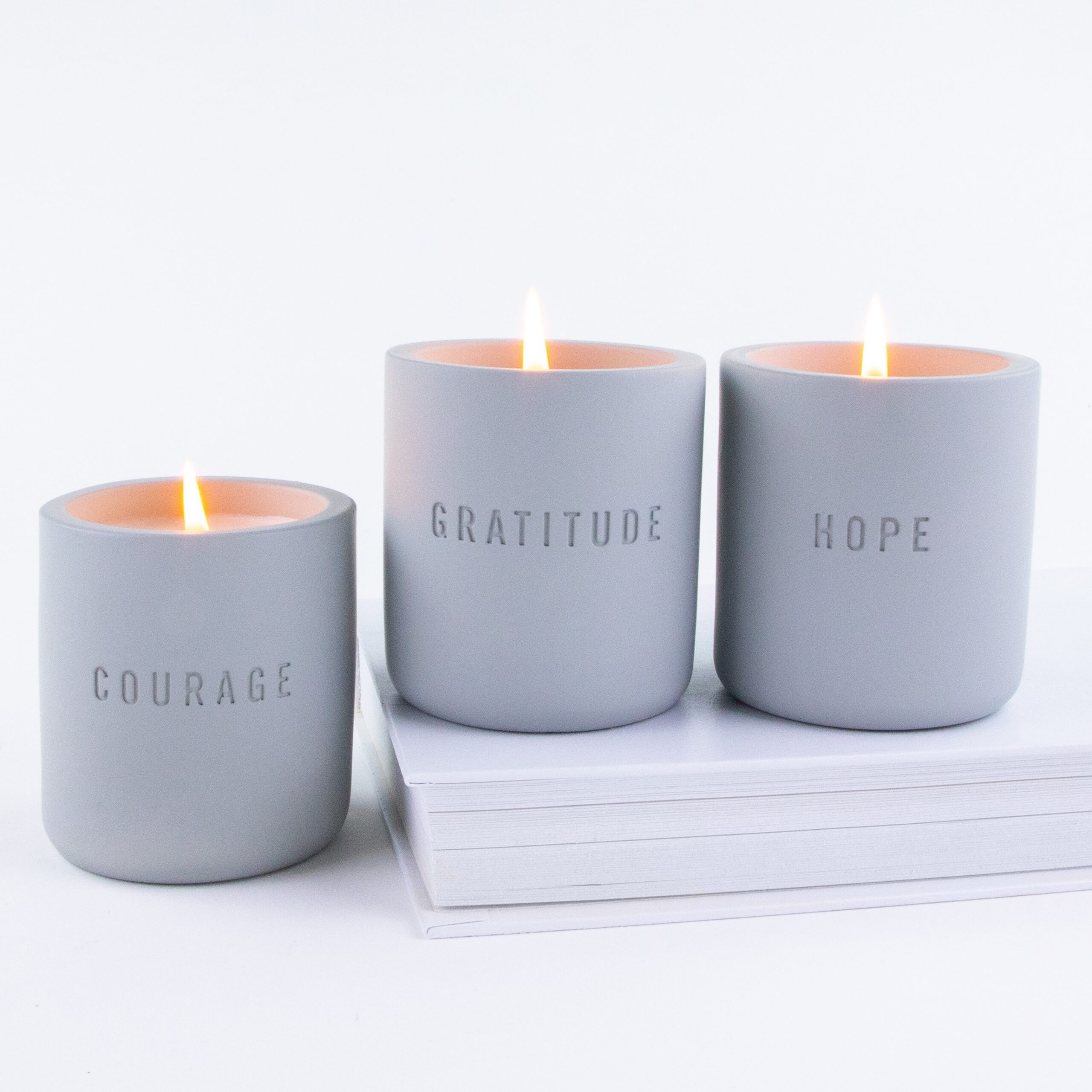 Candles that say courage, gratitude, and hope