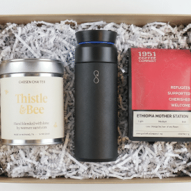 a gift box with tea, coffee, and a black brew flask