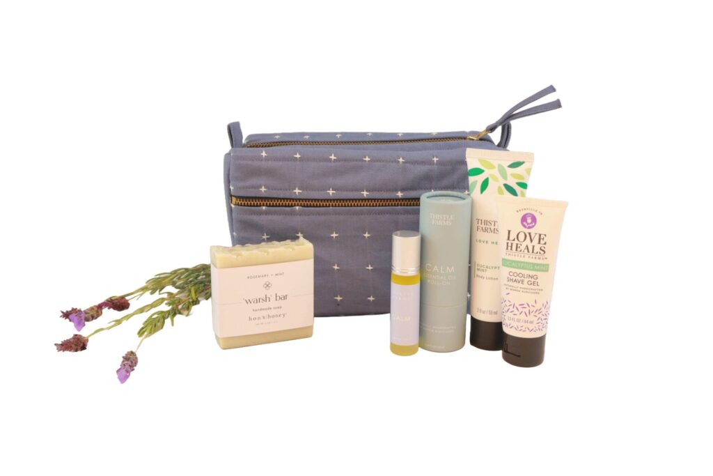 Anchal Gift Set with Blue Bag wellness gift set with a blue bag, warsh bar, essential oils, body lotion, and cooling shave gel