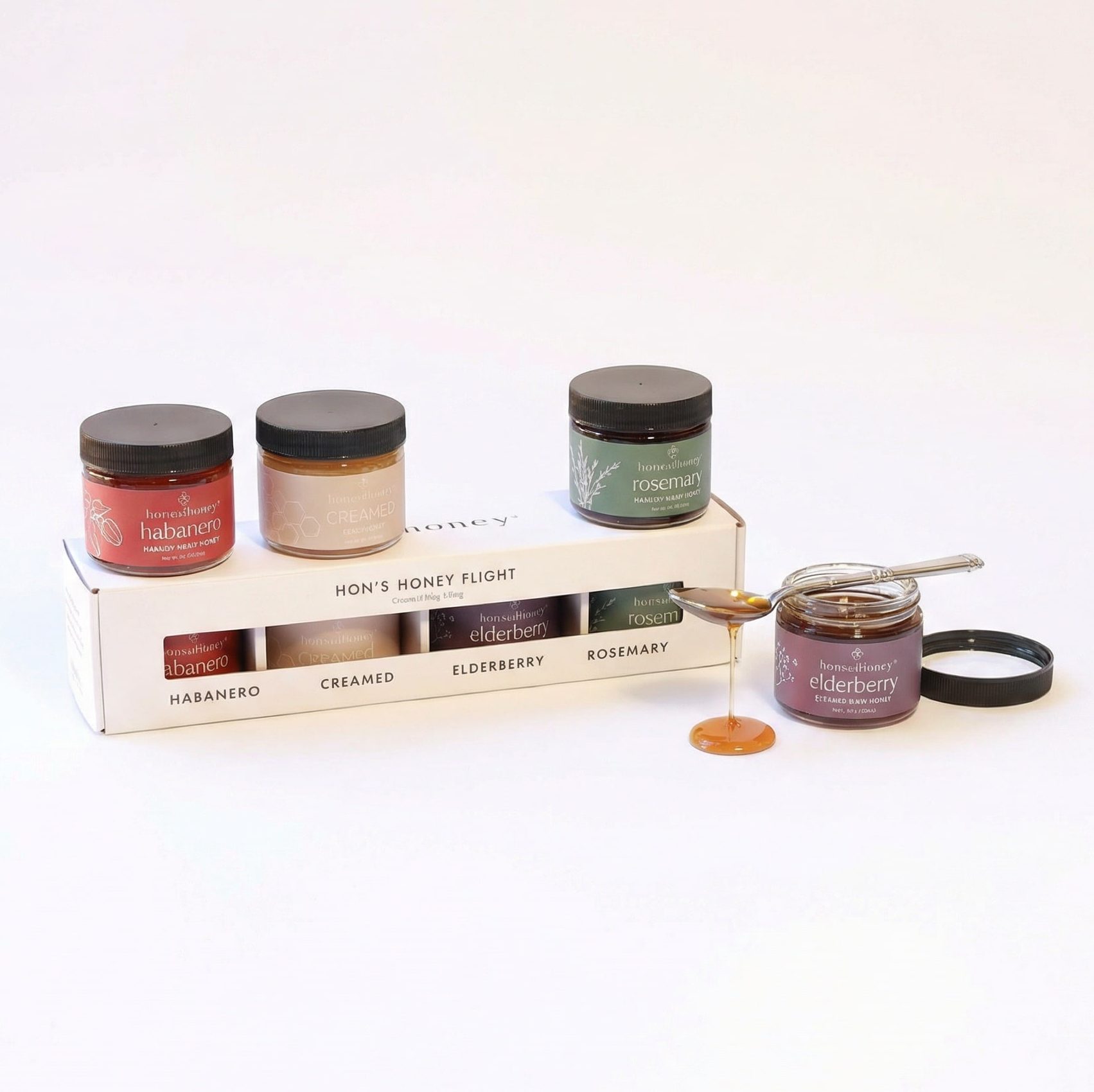 HH Honey flight AI A Honey Flight of infused honey flavors made by women survivors. A corporate gift that gives back