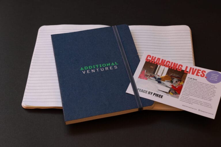 Notebooks made from recycled cotton, affordable customizable gift option.