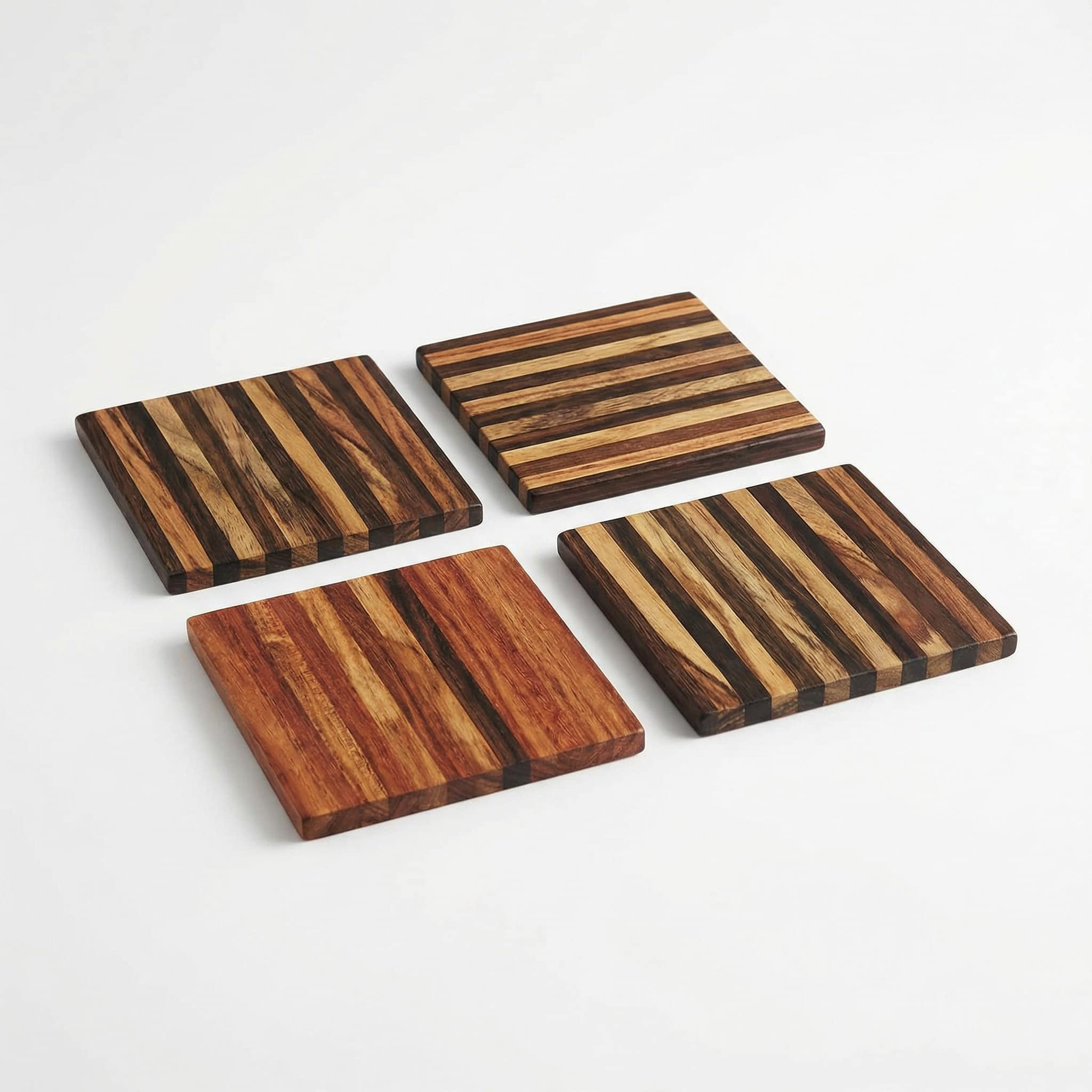 joyok' che coasters itza wood 4 coasters made of striped wood laid out in a square