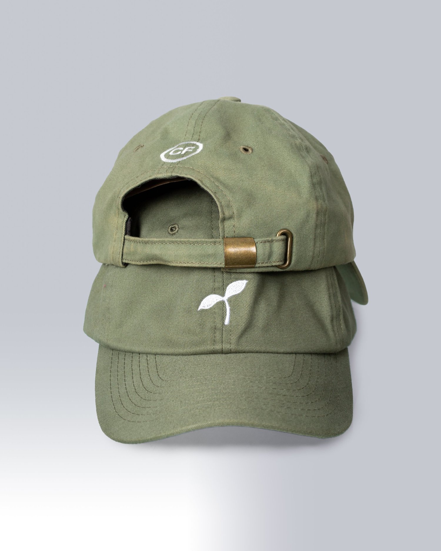 Topiku hat front and back green hats stacked