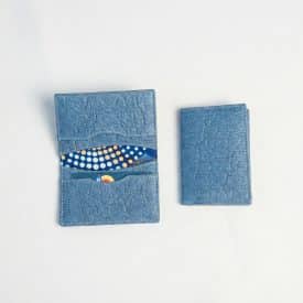Dokmai Piñatex Card Holder a card holder made from Piñatex Vegan Leather laid out in both an open and a closed position