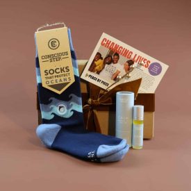 A corporate holiday gift of socks and essential oils